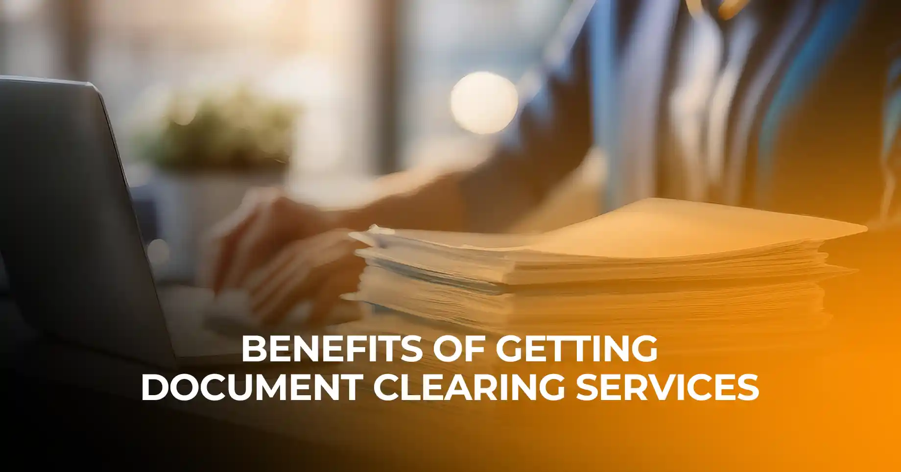 Person working at a desk highlighting the benefits of getting document clearing services for outpass in UAE