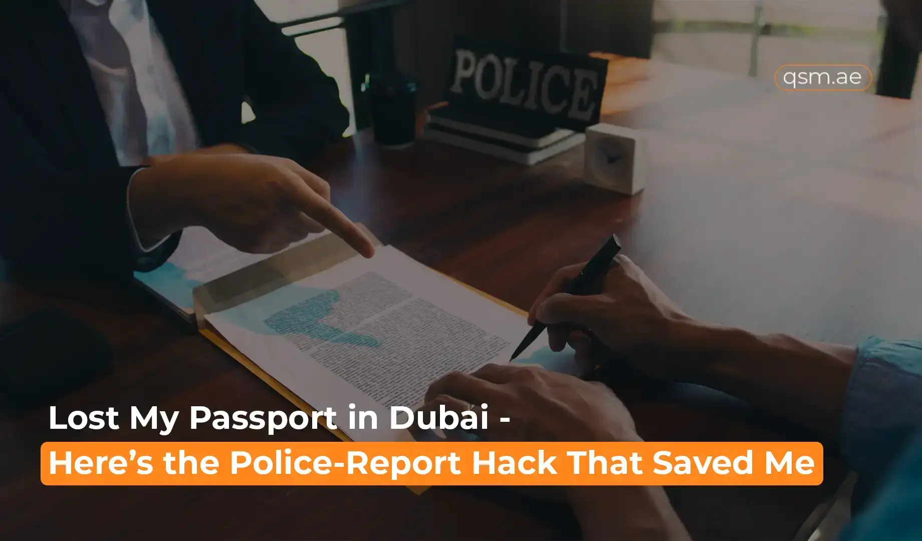 police officer reviewing and pointing at a document while assisting a person with a lost passport case in Dubai