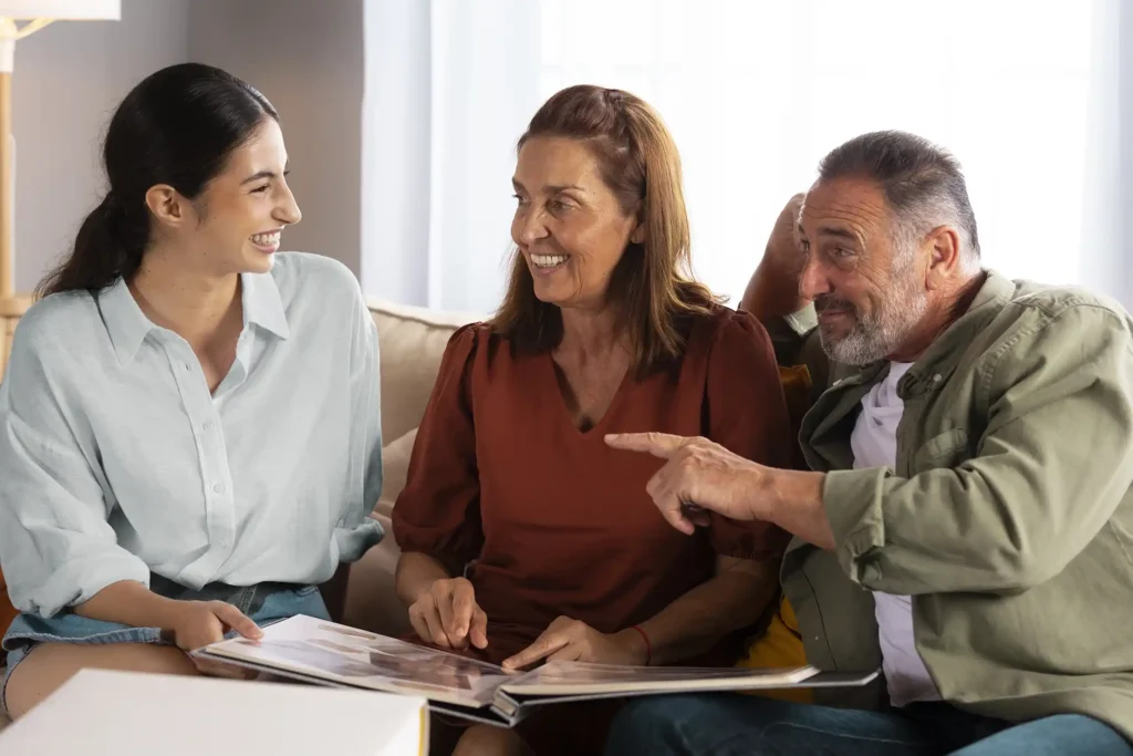 Happy family discussing UAE parent visa application